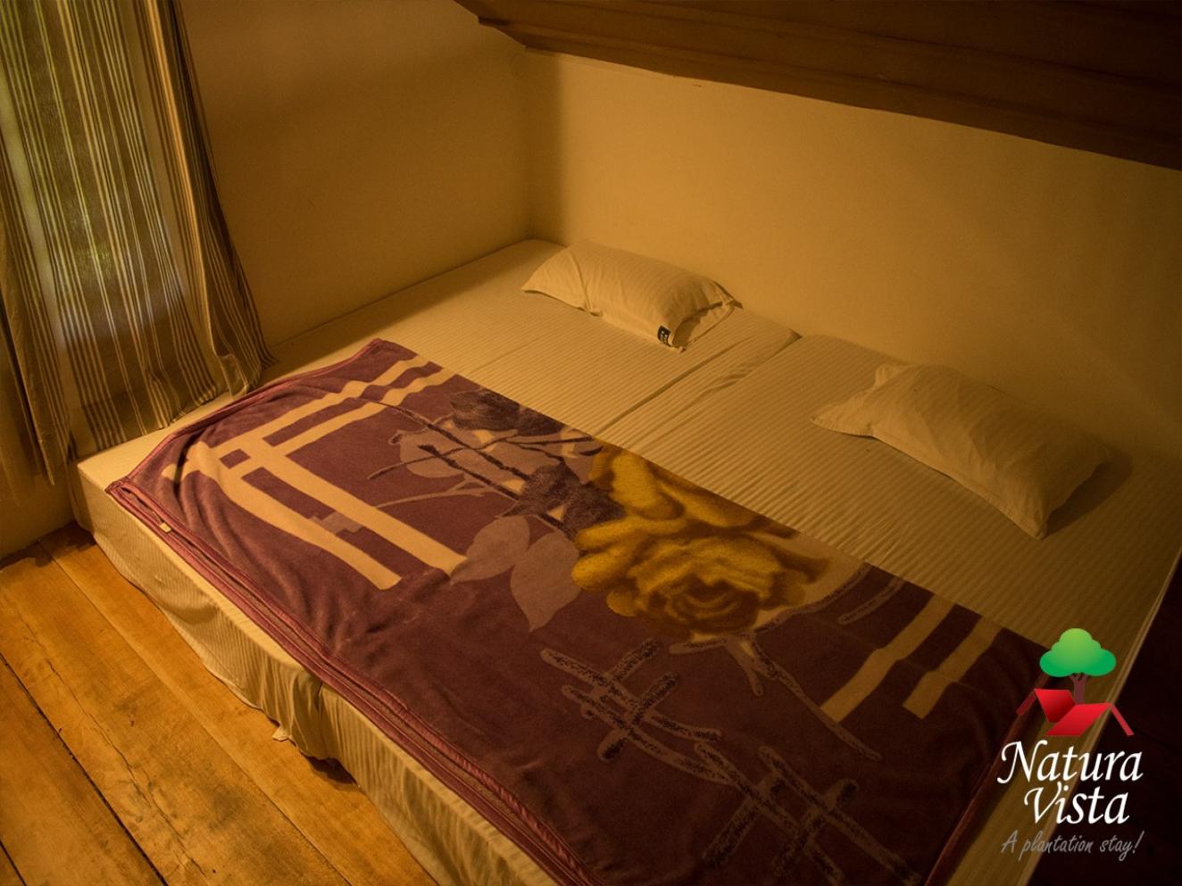 Duplex bedroom with attic